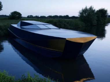 luxury yacht, modern boat design, sleek boat, black and gold boat, river boat, high tech boat, futuristic watercraft, exclusive watercraft, custom boat, innovative boat design